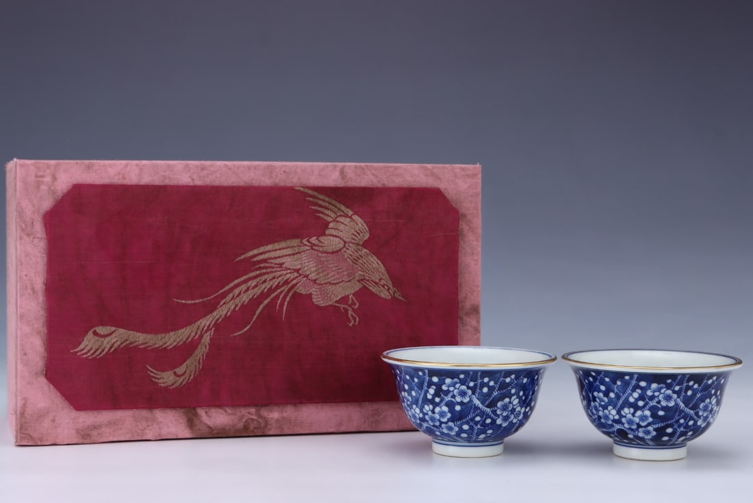 A pair of Exquisite Blue and White Plum Blossom Pattern Cups: A pair of Exquisite Blue and White Plum Blossom Pattern Cups,Qing Dynasty, China,Yongzheng Six-character Mark,Size:2inx3.6in