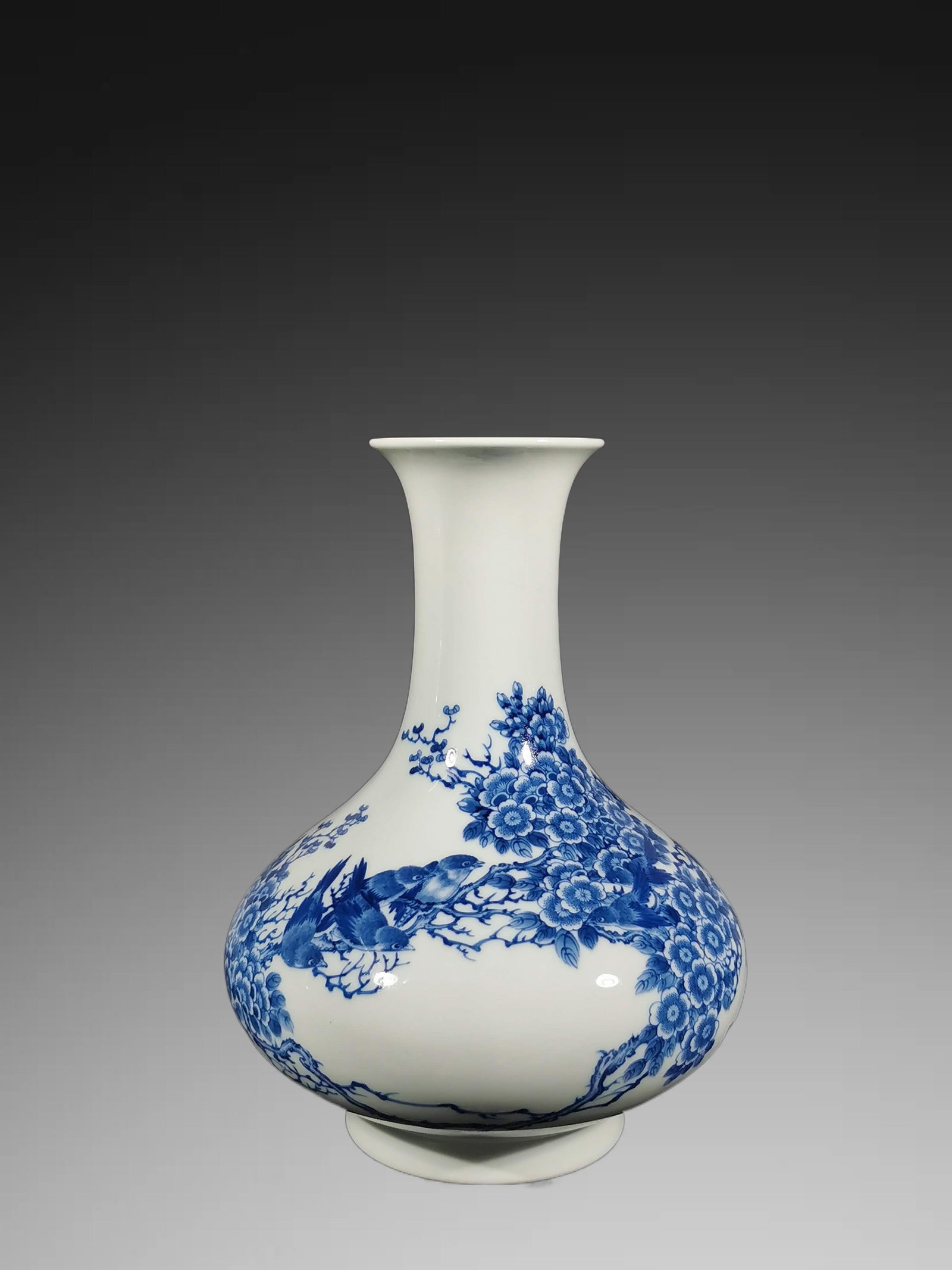 An Exquisite Blue and White Flower and Bird Pattern Vase: An Exquisite Blue and White Flower and Bird Pattern Vase,Republic of China,With Mark,Size:10inx3.3inx7.7in 青花花鸟纹瓶,民国,带款