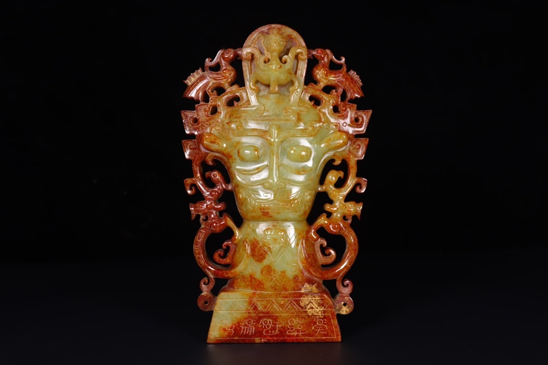 An Exquisite Hotan Jade Human-Face Ornament (1 of 9)