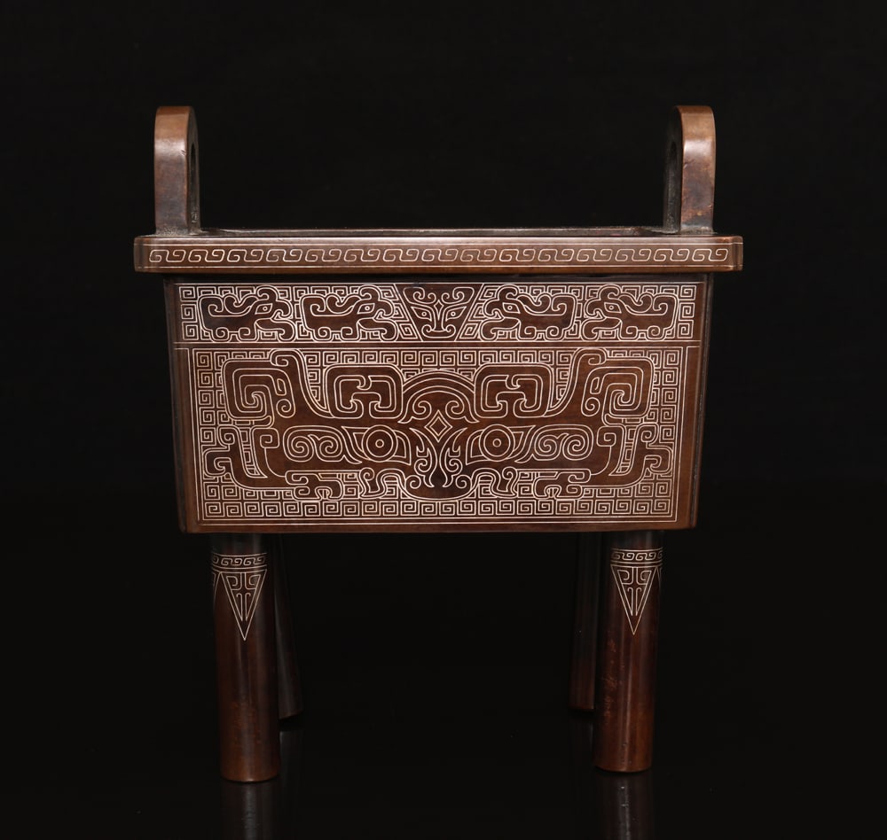 An Exquisite Bronze inlaid Silver Wire Four-Legs Double-Ears Censer: An Exquisite Bronze inlaid Silver Wire Four-Legs Double-Ears Censer,Ming Dynasty, China,With Mark,Size:7.7inx6.5in,Weight:3859g 铜掐银丝四足双耳炉