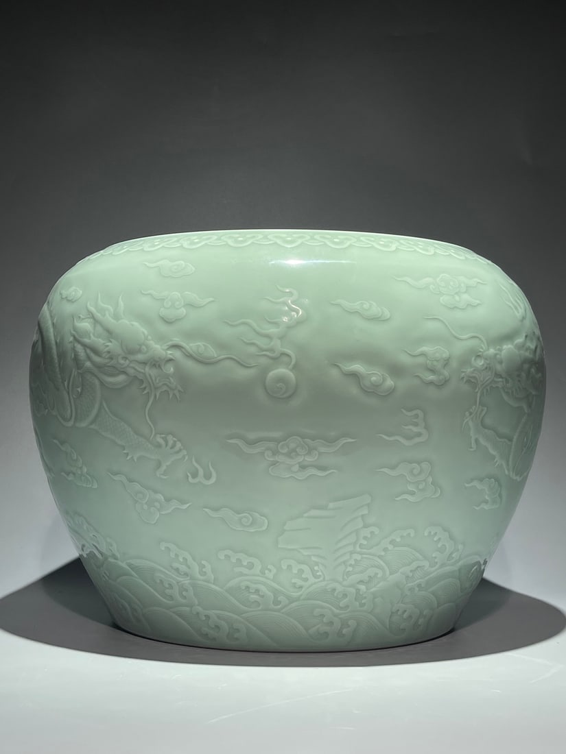 An Exquisite Pea-Green Glaze Dragon Pattern Vat: An Exquisite Pea-Green Glaze Dragon Pattern Vat,Qing Dynasty, China,Qianlong Six-character Mark,Size:10.4inx14.6in 豆青釉龙纹缸,中国清代,