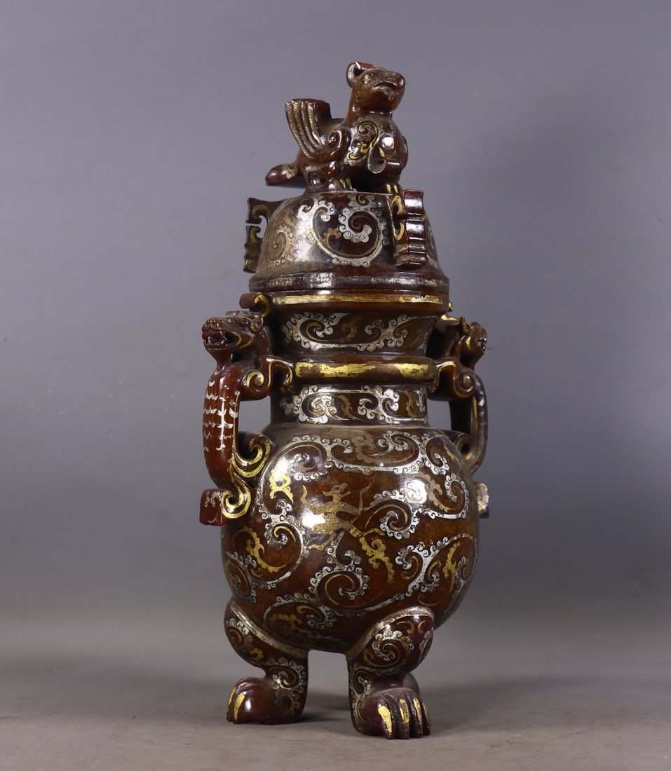 An Exquisite Hotan Jade Gold and Silver-Inlaid Double-Ears and Tripod Jar: An Exquisite Hotan Jade Gold and Silver-Inlaid Double-Ears and Tripod Jar,Qing Dynasty, China,Size:11inx5.3inx3.7in,Weight:1781g