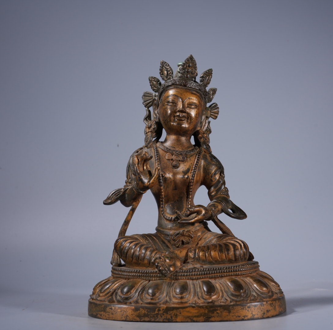 An Exquisite Coppery Statue of Tara: An Exquisite Coppery Statue of Tara,Ming Dynasty, China,Size:7.9inx5.5in,Weight:2125g 紫铜度母造像,中国明代