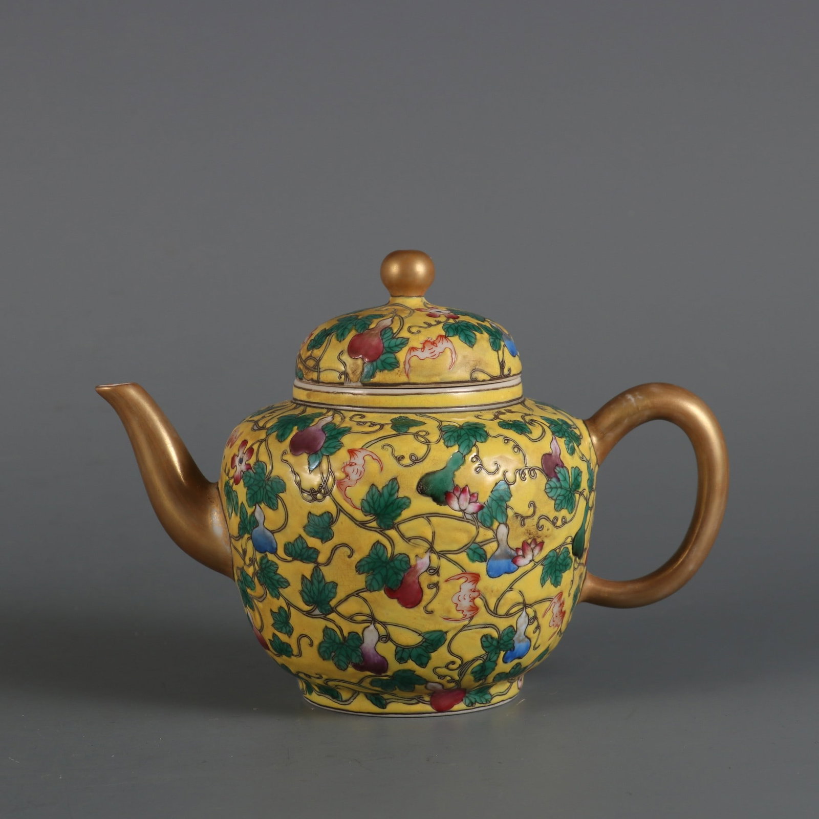 An Exquisite Yellow Ground Famille-Rose Gourd Pattern Ewer: An Exquisite Yellow Ground Famille-Rose Gourd Pattern Ewer,Qing Dynasty, China,Yongzheng Four-character Mark,Size:4.2inx5.7inx2in