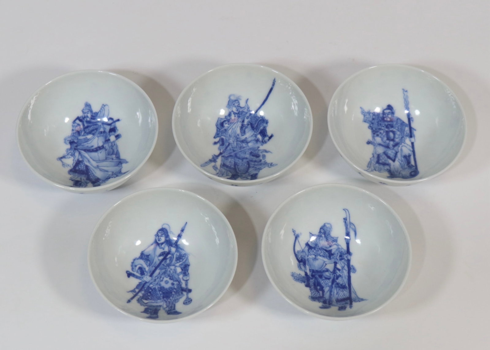 A Set of Exquisite Five Blue and White Figures Pattern Cup: A Set of Exquisite Five Blue and White Figures Pattern Cup,Qing Dynasty, China,Yongzheng Six-character Mark,Size:1.5inx3.5in 一套五只青花人物纹
