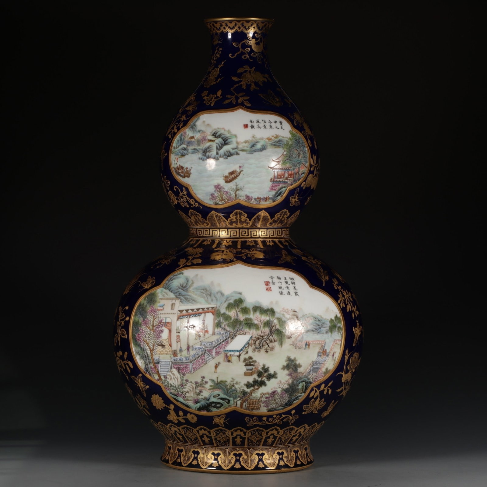 An Exquisite Ji Blue Glazed Painted Gold Famille-Rose Landscape and Figures Pattern Gourd Vase: An Exquisite Ji Blue Glazed Painted Gold Famille-Rose Landscape and Figures Pattern Gourd Vase,Qing Dynasty, China,Qianlong Four-character Mark,Size:21.8inx3.4inx7.4in 霁蓝釉描