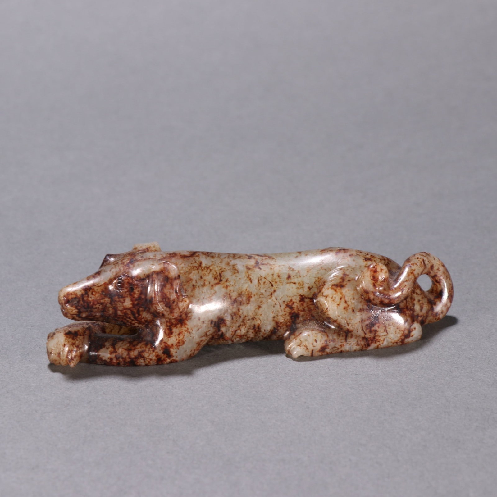 An Exquisite Hotan Jade Dog: An Exquisite Hotan Jade Dog,Han Dynasty, China,Size:1inx4.2in,Weight:116g 和田玉犬,中国汉代