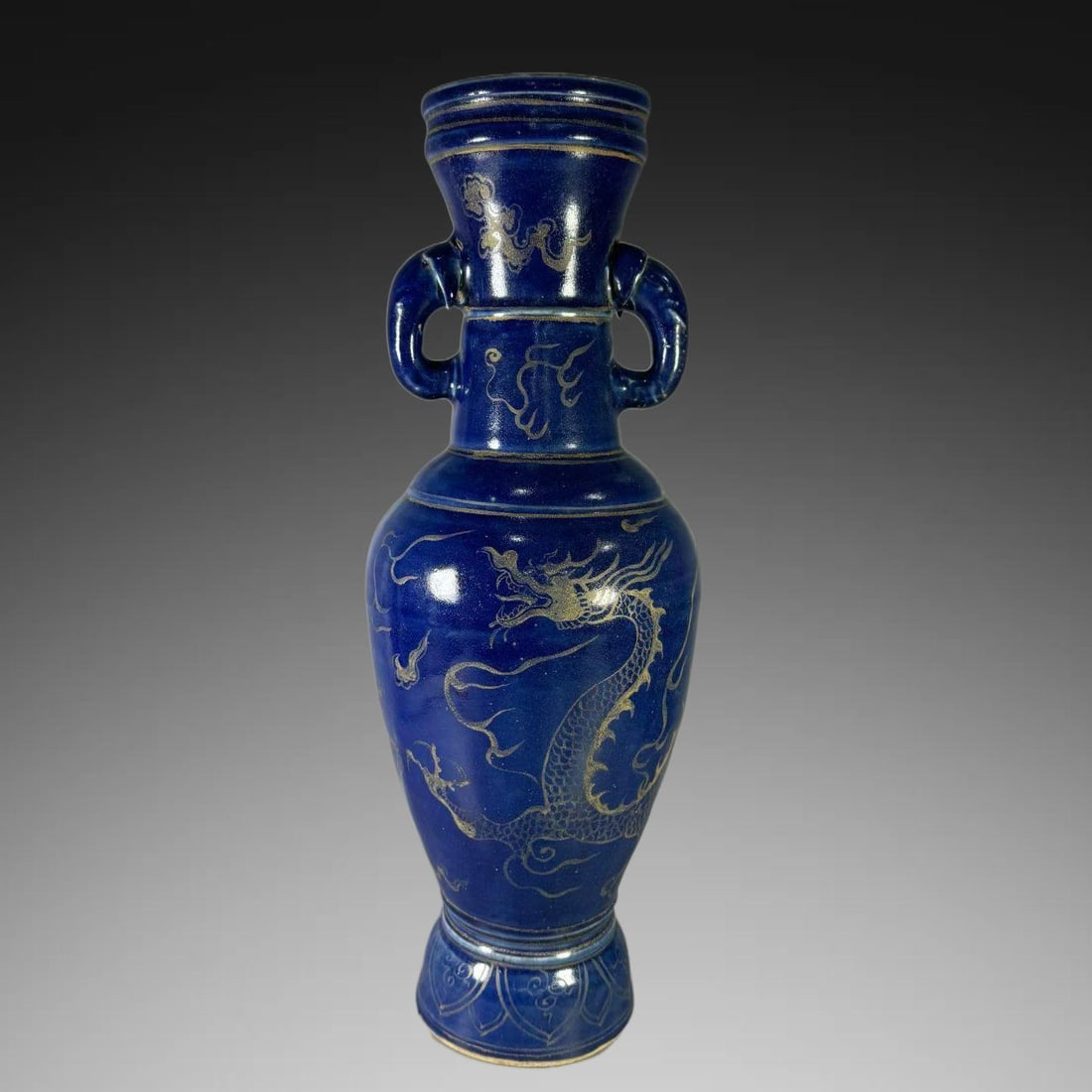 An Exquisite Ji Blue Glazed Painted Gold Dragon Pattern Double-Ears Vase: An Exquisite Ji Blue Glazed Painted Gold Dragon Pattern Double-Ears Vase,Yuan Dynasty, China,Size:15.9inx6.3in 霁蓝釉描金龙纹双耳瓶,中