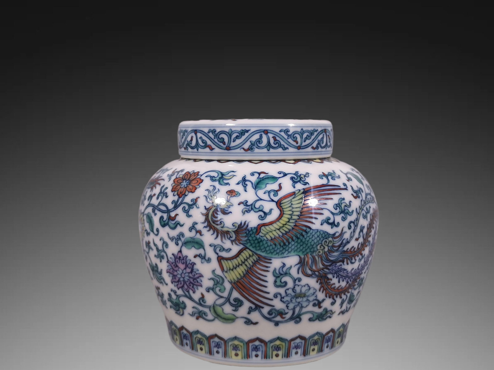An Exquisite Blue and White Doucai Lotus Dragon and Phoenix Pattern Jar: An Exquisite Blue and White Doucai Lotus Dragon and Phoenix Pattern Jar,Qing Dynasty, China,Yongzheng Six-character Mark,Size:4.6inx2.7inx5.1in 青花斗彩缠枝莲