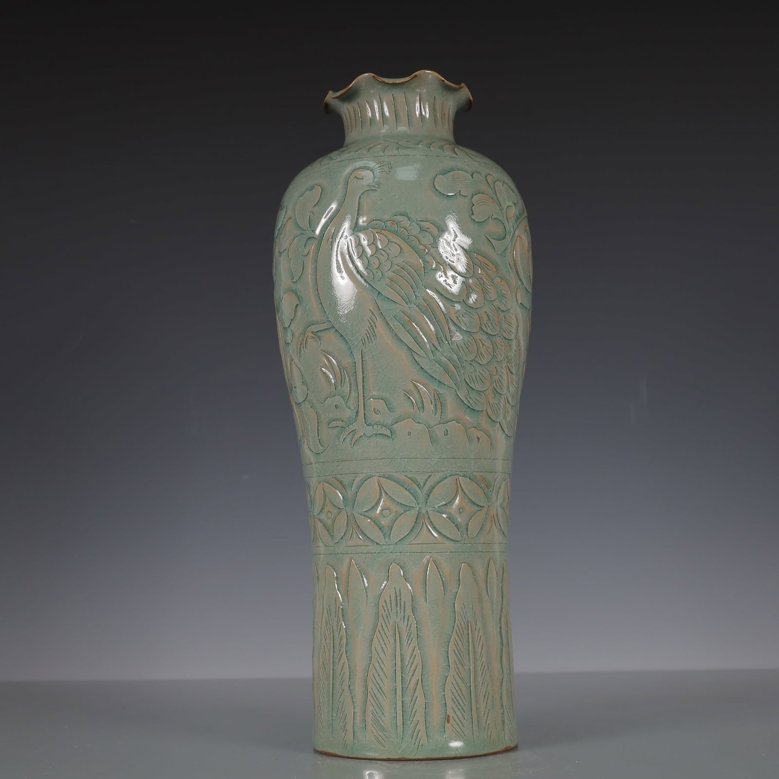 A Exquisite Yao zhou yao Flower and Bird Pattern Vase: A Exquisite Yao zhou yao Flower and Bird Pattern Vase Song Dynasty, China Size:4.9inx4.9inx12.8in Weight:1450g耀州窑花鸟纹瓶 中国宋代 