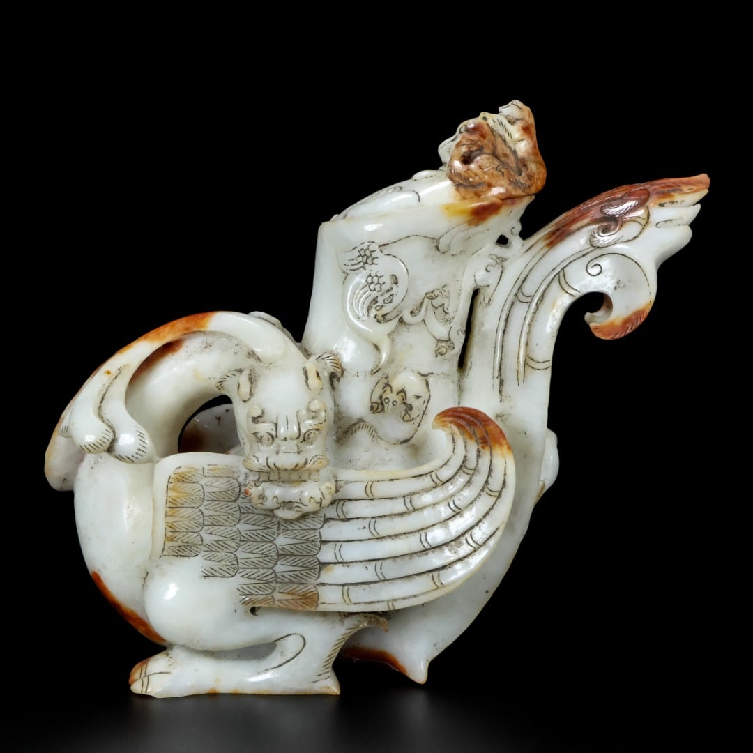 An Exquisite White Jade Dragon and Phoenix Pattern Beast-Shaped Cup: An Exquisite White Jade Dragon and Phoenix Pattern Beast-Shaped Cup,Qing Dynasty,China,Size:8.8inx7.9inx4.3in,Weight:2790g白玉龙凤纹兽形杯,中Þ