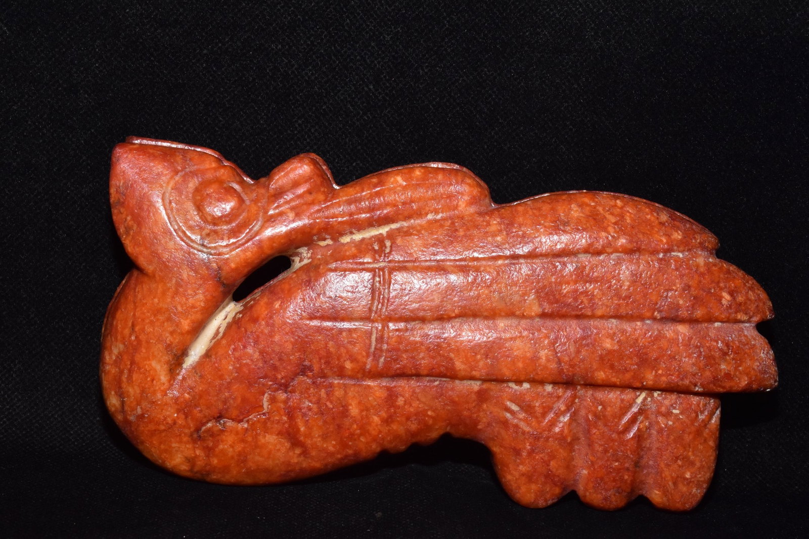An Exquisite Hemo Jade Bird Pendant: An Exquisite Hemo Jade Bird Pendant,Hongshan Culture,Size:6.5inx3.9in,Weight:820g河磨玉鸟挂件,红山文化,Size:16.5cmx10cm,Weight:820g