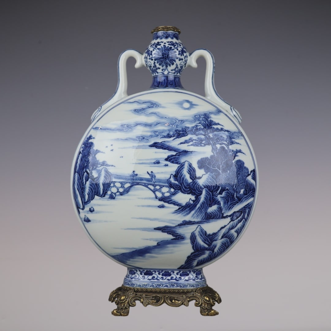 A Huge Blue and White Inlaid Bronze Landscape and Figure Pattern Double-Ears Vase: A Huge Blue and White Inlaid Bronze Landscape and Figure Pattern Double-Ears Vase,Qing Dynasty,China,Qianlong Six-character Mark,Size:18.5inx11.8inx7.1in青花镶铜山水