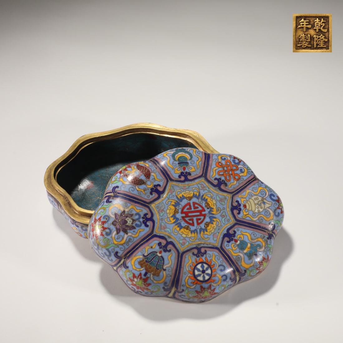 An Exquisite Cloisonne Lotus and Eight Treasures Pattern Box with Cover: An Exquisite Cloisonne Lotus and Eight Treasures Pattern Box with Cover,Qing Dynasty,China,Qianlong Four-character Mark,Size:3.1inx7.5in,Weight:2600g景泰蓝缠枝莲