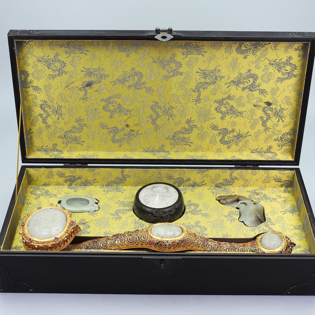 A Set of Huge Filigree and Gilding Inlaid White Jade Ornaments,Inlaid Gems: A Set of Huge Filigree and Gilding Inlaid White Jade Ornaments,Inlaid Gems,Qing Dynasty,China,Yongzheng Four-character Mark,Size:5.1inx22.4in,(Ruyi)19.7inx4.7in,(Brush Washer)0.8inx3.1in,(Jasper)2.4in