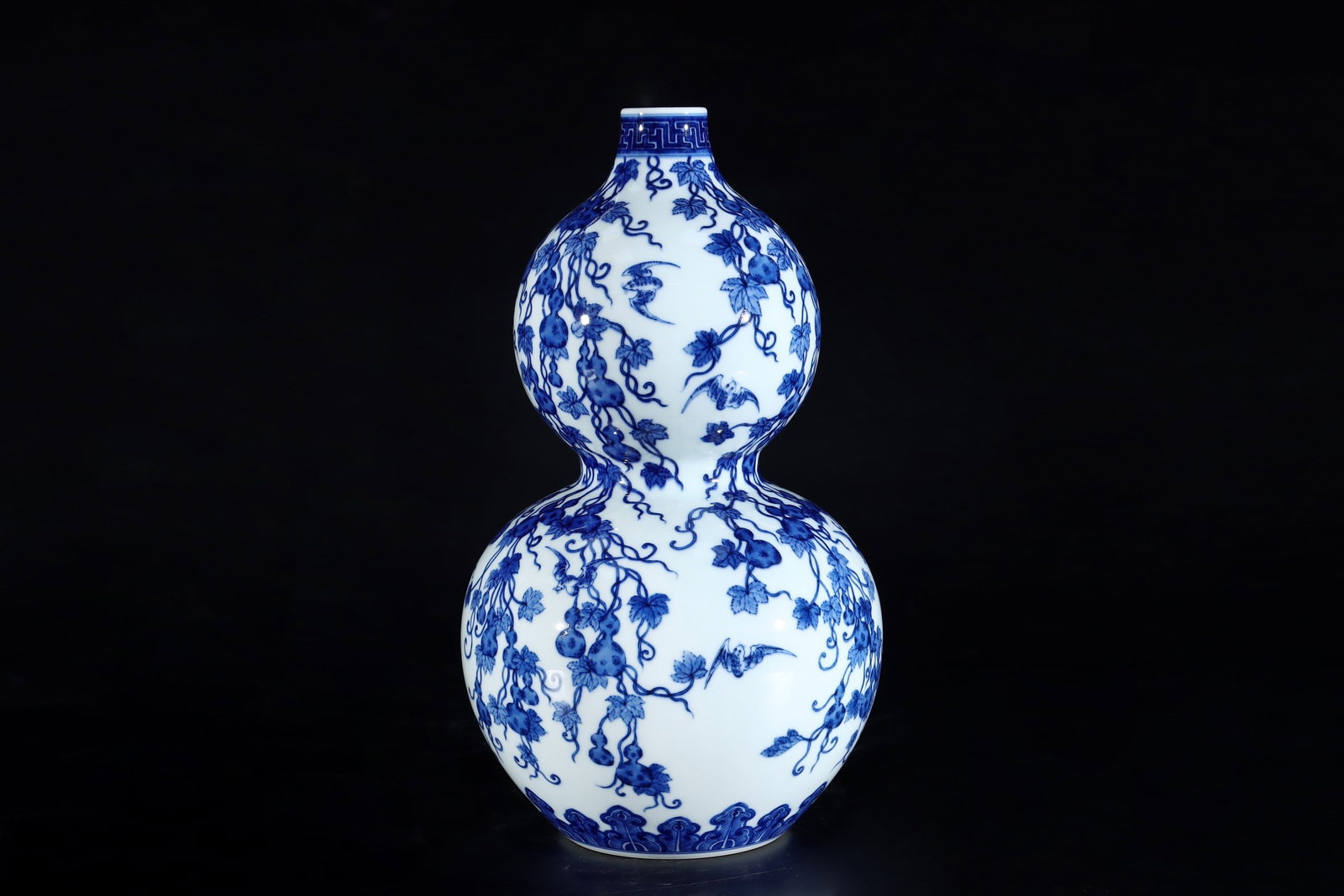 A Rare Blue and White Bats and Gourd Pattern Gourd-Shaped Vase: A Rare Blue and White Bats and Gourd Pattern Gourd-Shaped Vase,Qing Dynasty, China,Qianlong Six-character Mark,Size:12.6inx6.7in青花蝙蝠葫芦纹葫芦
