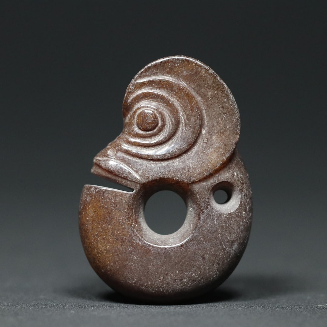 An Exquisite White Jade Pig-Dragon Pendant: An Exquisite White Jade Pig-Dragon Pendant,Hongshan Culture,Size:1.9inx1.3inx0.5in,Weight:32.7g白玉猪龙挂件,红山文化,Size:4.8cmx3.4cmx1.3cm,