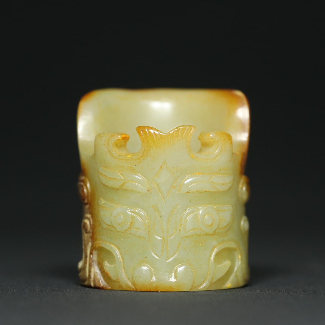 An Exquisite White Jade Beast-Face and Dragon Pattern Fingerstall: An Exquisite White Jade Beast-Face and Dragon Pattern Fingerstall,Qing