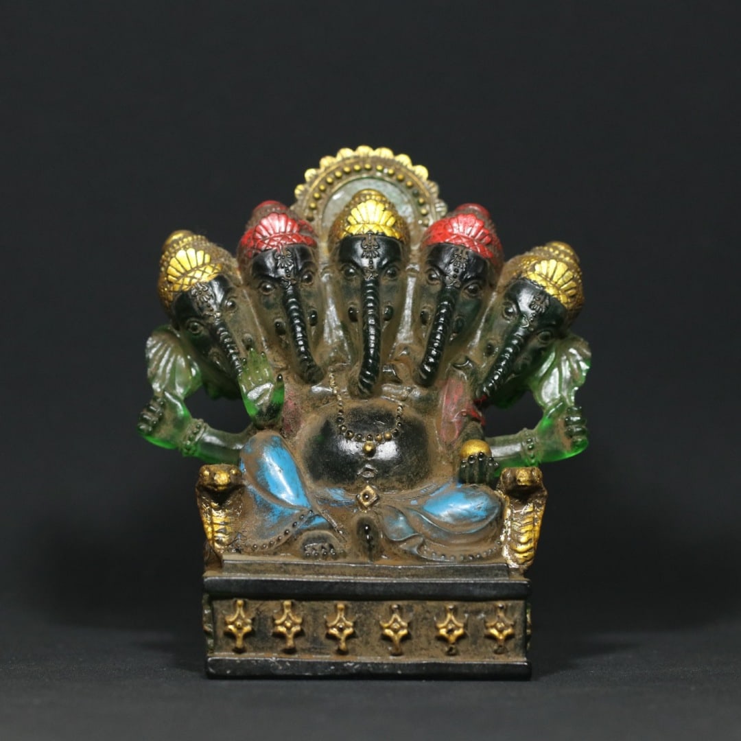 An Exquisite Glass Painted Color Elephant-head Ornament: An Exquisite Glass Painted Color Elephant-head Ornament,Qing Dynasty,China,Qianlong Four-character Mark,Size:3.4inx3.9inx2in,Weight:402g琉璃彩绘象首摆件