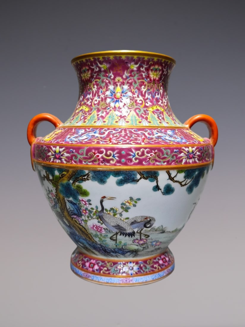 An Exquisite Enamel Ruby Red-Glazed Painted Gold Pine and Crane Pattern Double-Ears Vase: An Exquisite Enamel Ruby Red-Glazed Painted Gold Pine and Crane Pattern Double-Ears Vase,Qing Dynasty, China,Qianlong Four-character Mark,Size:9.2inx8.6inx7.9in珐琅彩胭脂
