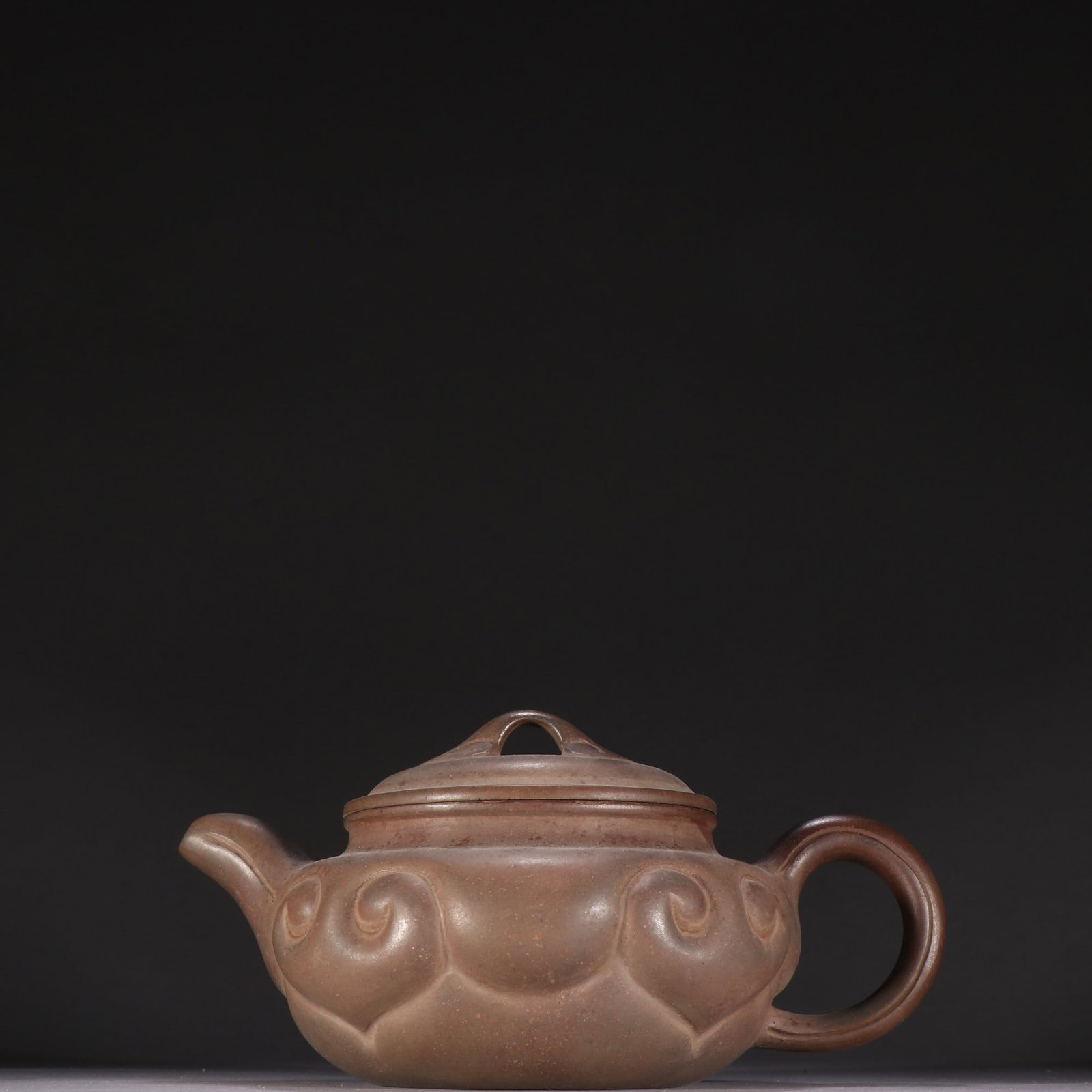 An Exquisite Purple Sands Ruyi Pattern Teapot (1 of 9)