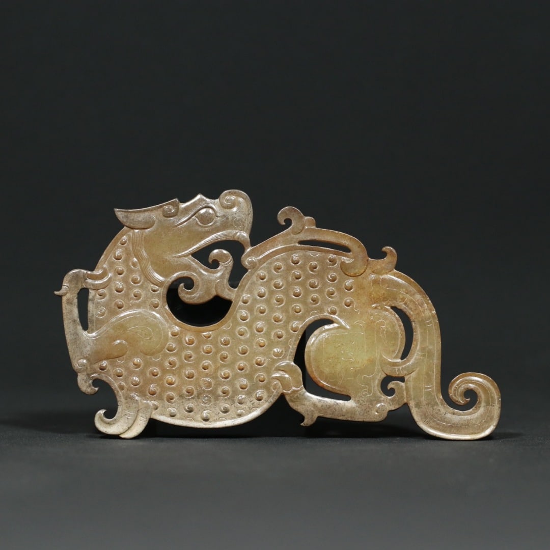 An Exquisite White Jade Dragon-Shaped Pendant (1 of 9)