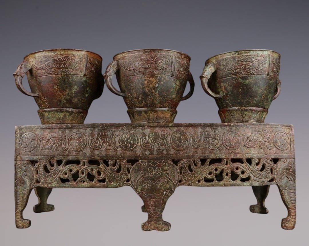 A Set of Archaic Bronze Auspicious Beast Pattern Double-Ears Food Vessels,With Base (1 of 9)