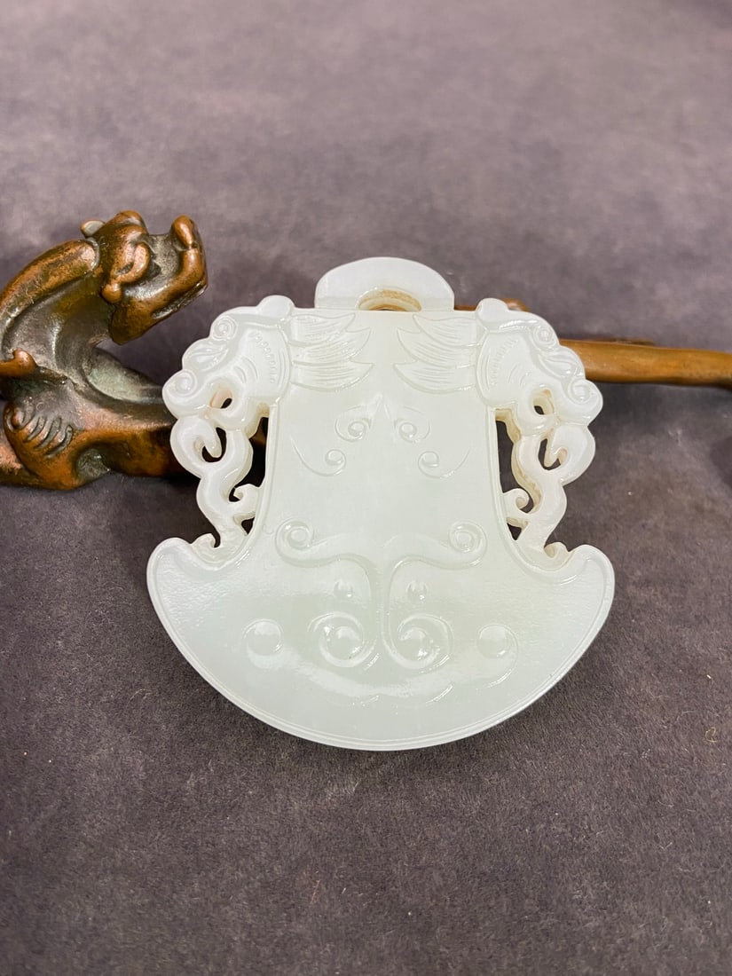 An Exquisite White Jade Dragon-head Axe-Shaped Pendant (1 of 9)