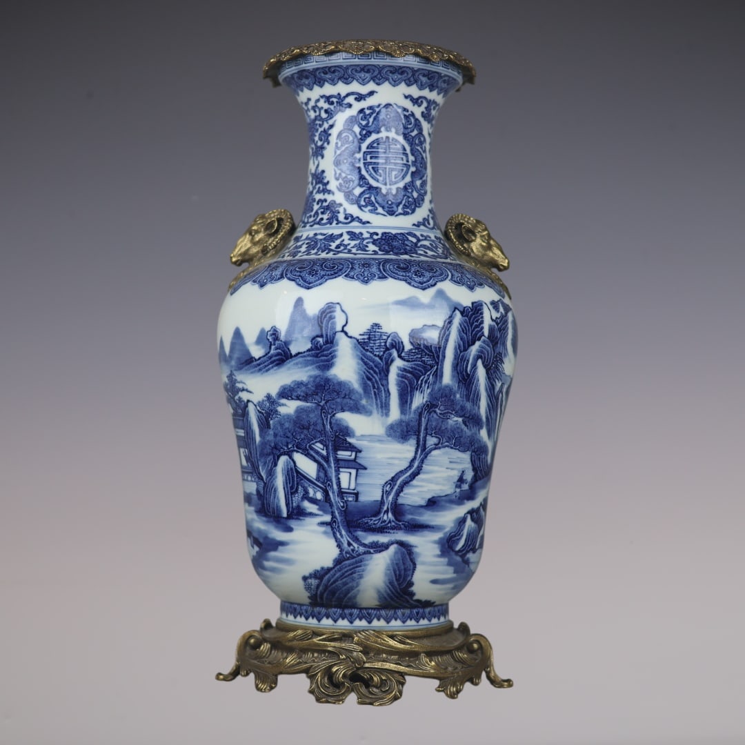 A Huge Blue and White Inlaid Bronze Landscape Pattern Sheep-Ears Vase: A Huge Blue and White Inlaid Bronze Landscape Pattern Sheep-Ears Vase,Qing Dynasty,China,Qianlong Six-character Mark,Size:17.7inx7.9inx8.3in青花镶铜山水纹 