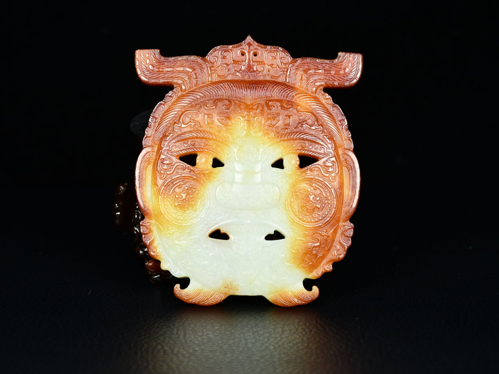 An Exquisite White Jade Beast-Face Pattern Figure-Shaped Pendant: An Exquisite White Jade Beast-Face Pattern Figure-Shaped Pendant,Qing Dynasty,
