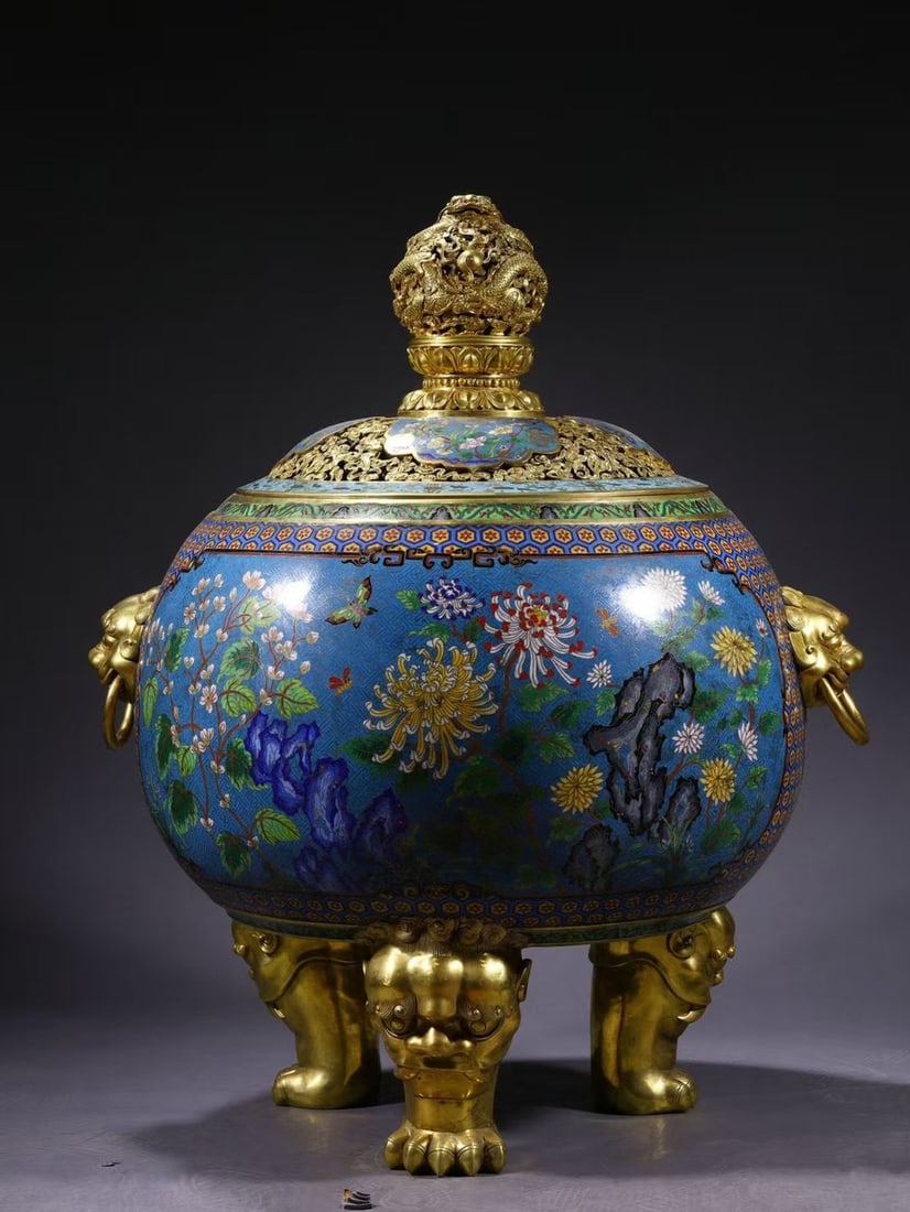 An Exquisite Cloisonne Dragon Pattern Flower and Butterfly Pattern Double-Ears and Tripod Censer: An Exquisite Cloisonne Dragon Pattern Flower and Butterfly Pattern Double-Ears and Tripod Censer Qing Dynasty, China Qianlong Six-character Mark Size:29.5inx25.2in