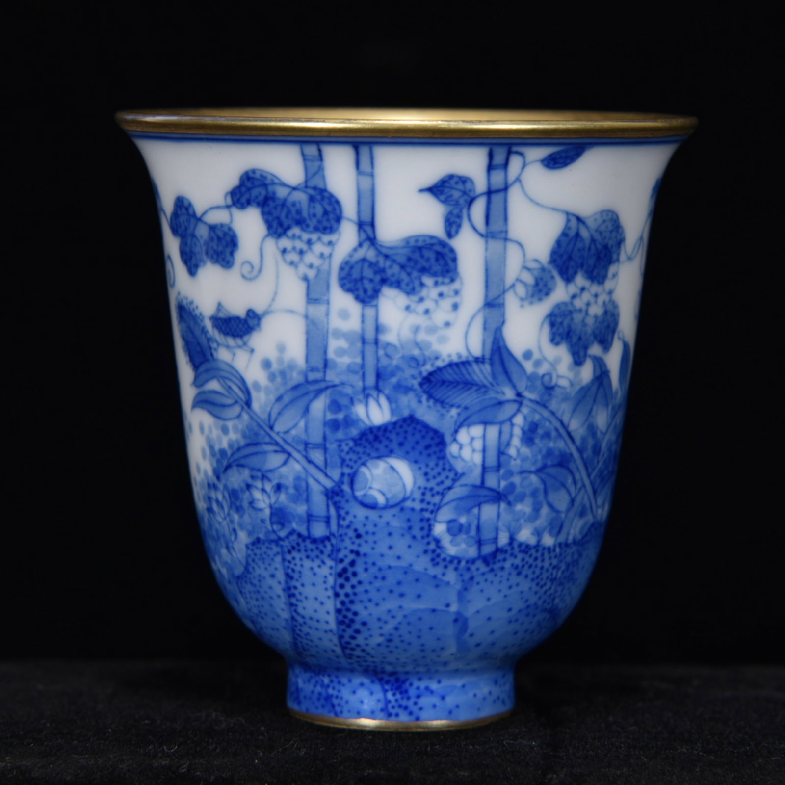 An Exquisite Blue and White Chai yao Gilding Melon and Fruit Pattern Cup: An Exquisite Blue and White Chai yao Gilding Melon and Fruit Pattern Cup,Qing Dynasty, China,With Mark,Size:2.6inx2.4in青花柴窑鎏金瓜果纹杯,