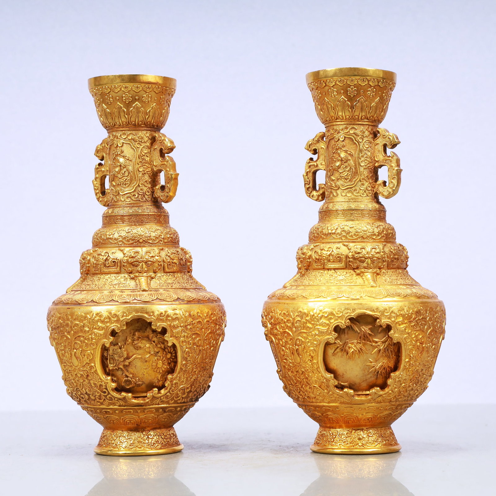 A Exquisite A pair of Gilt Bronze Lotus Pattern Flower and Bird Pattern Bamboo Pattern Double-Ears: A Exquisite A pair of Gilt Bronze Lotus Pattern Flower and Bird Pattern Bamboo Pattern Double-Ears Vase Qing Dynasty, China Qianlong Four-character Mark Size:4.7inx10.2in Weight:3050g一对&