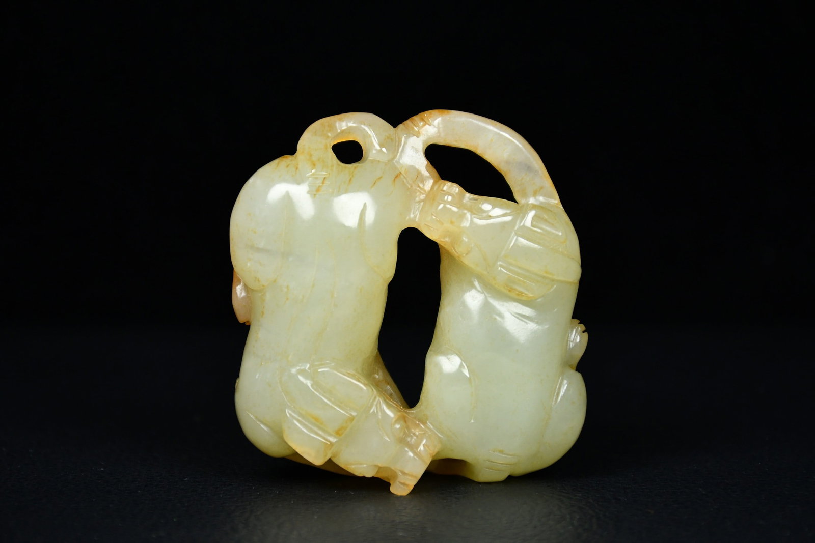 An Exquisite White Jade Hollow Animal Ornament (1 of 9)