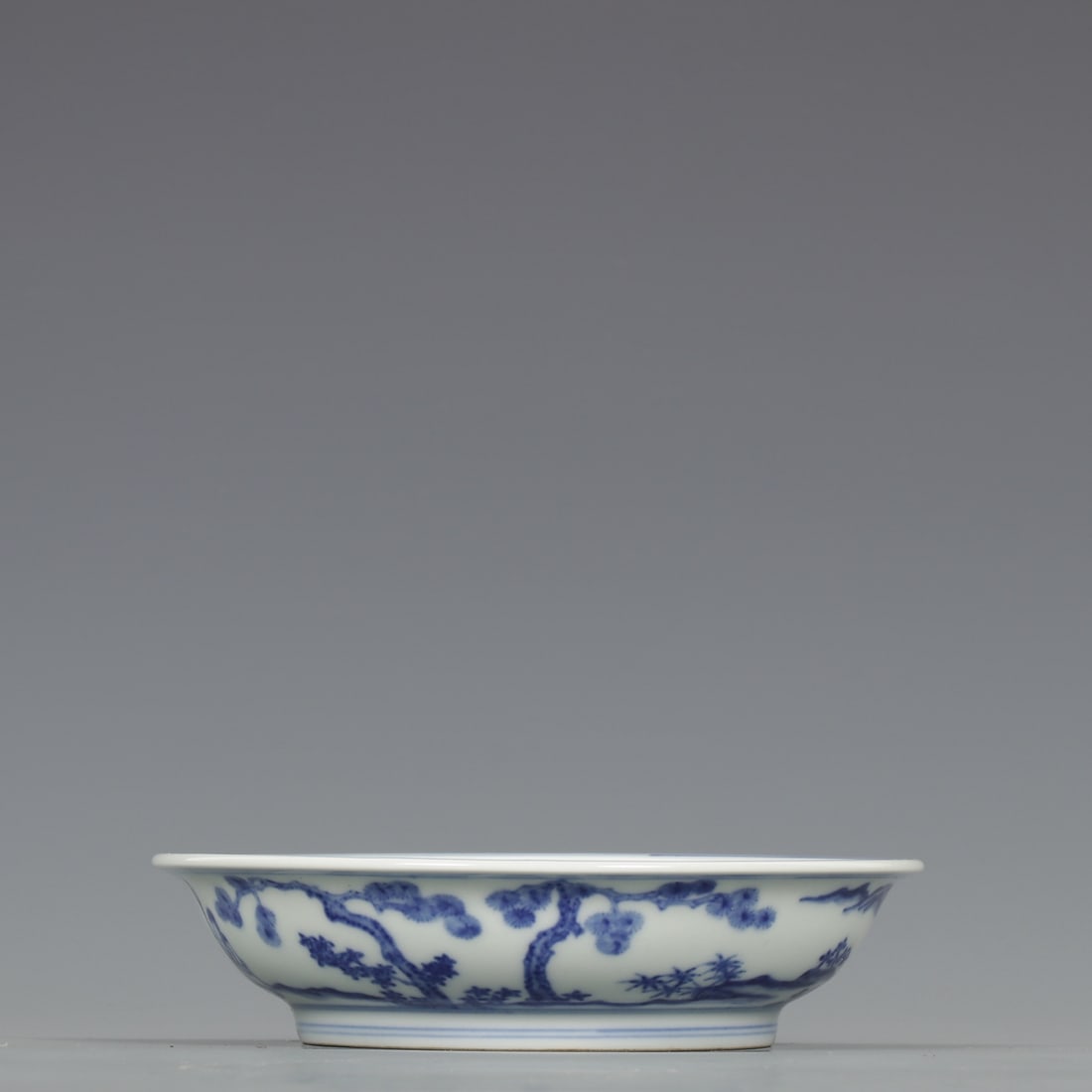 An Exquisite Blue and White Figure Pine,Bamboo and Plum Blossom Pattern Plate: An Exquisite Blue and White Figure Pine,Bamboo and Plum Blossom Pattern Plate,Ming Dynasty,China,Xuande Six-character