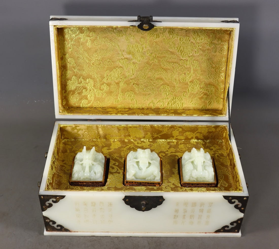 A Set of Fine White Jade Cover with Gold Dragon Pattern Seals,Inlaid Gems: A Set of Fine White Jade Cover with Gold Dragon Pattern Seals,Inlaid Gems,Qing Dynasty,China,Qianlong Four-character Mark,Size:(Box)4.7inx11inx5.9in,(Seal)3inx2inx2in,2.6inx2.2inx2in,Total Weight:3720