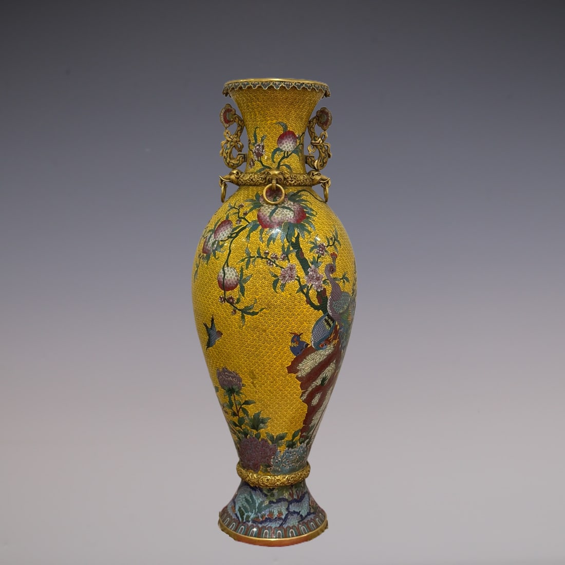 An Exquisite Cloisonne Flower and Bird Pattern Vase: An Exquisite Cloisonne Flower and Bird Pattern Vase Qing Dynasty, China Qianlong Four-character Mark Size:30.7inx11.8in Weight:21.6kg景泰蓝橄榄瓶 中国&#