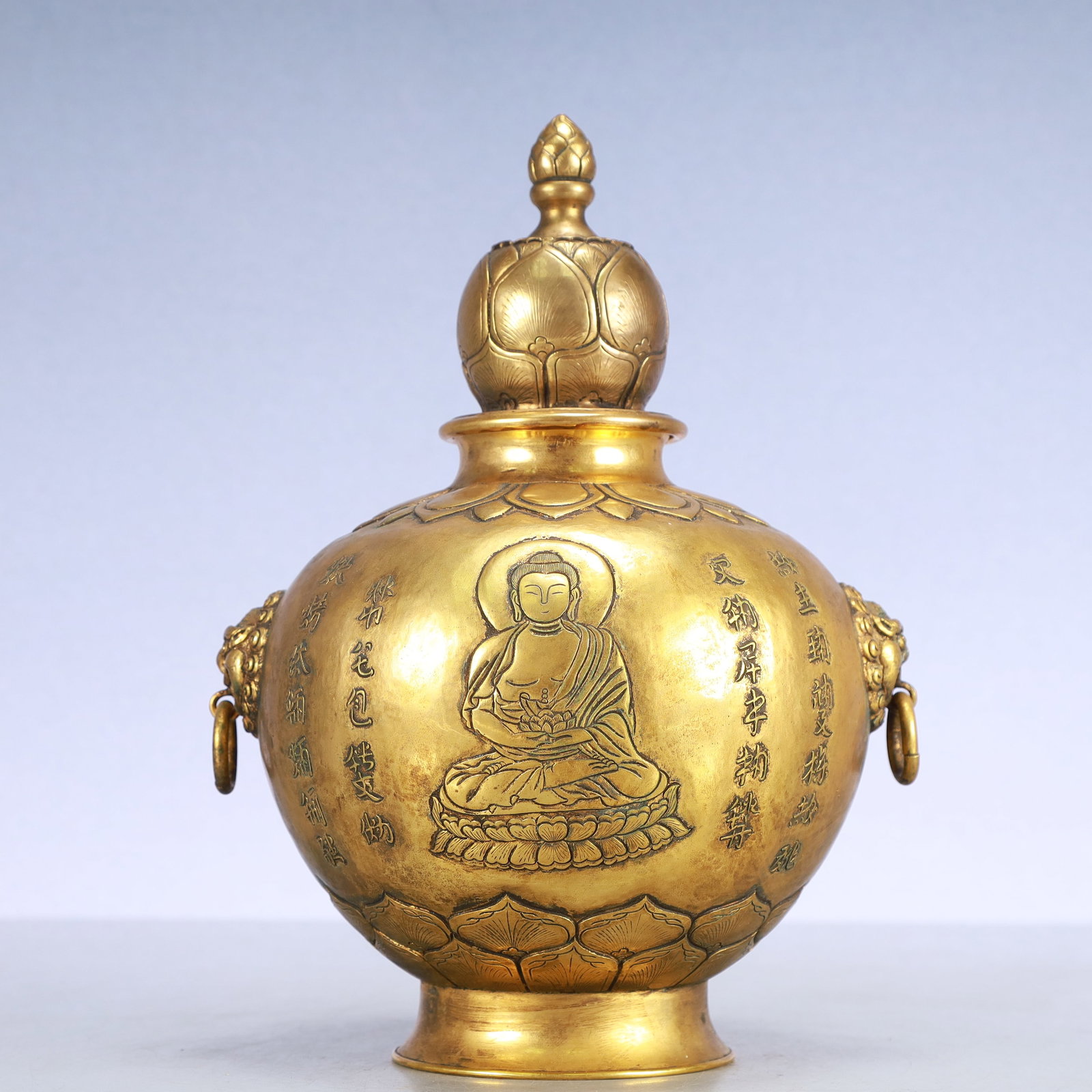 A Exquisite Gilt Bronze Buddha statue Pattern with poem Double-Ears Vase: A Exquisite Gilt Bronze Buddha statue Pattern with poem Double-Ears Vase Qing Dynasty, China Size:7.5inx5.9inx9.8in Weight:800g铜鎏金佛像纹诗文双&