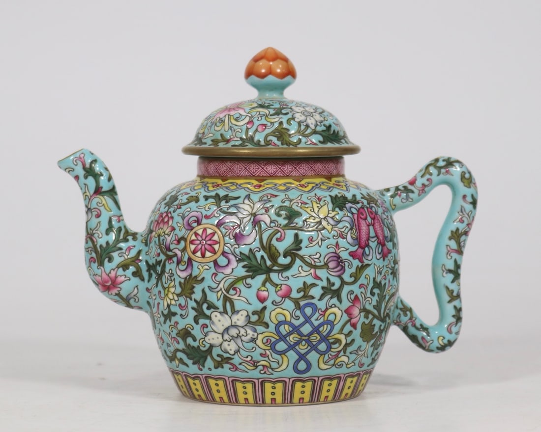 An Exquisite Turquoise Ground Famille-Rose Painted Gold Lotus and Eight Treasures Pattern Ewer: An Exquisite Turquoise Ground Famille-Rose Painted Gold Lotus and Eight Treasures Pattern Ewer,Qing Dynasty, China,Qianlong Six-character Mark,Size:5.7inx7.1in松石绿地粉&