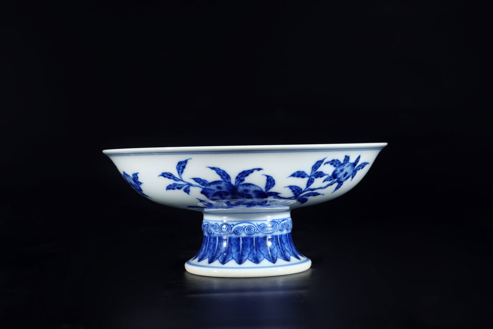 An Exquisite Blue and White Lotus and Eight Treasures Pattern Stem Plate: An Exquisite Blue and White Lotus and Eight Treasures Pattern Stem Plate,Qing Dynasty, China,Qianlong Six-character Mark,Size:3inx6.7in青花缠枝莲八宝纹&