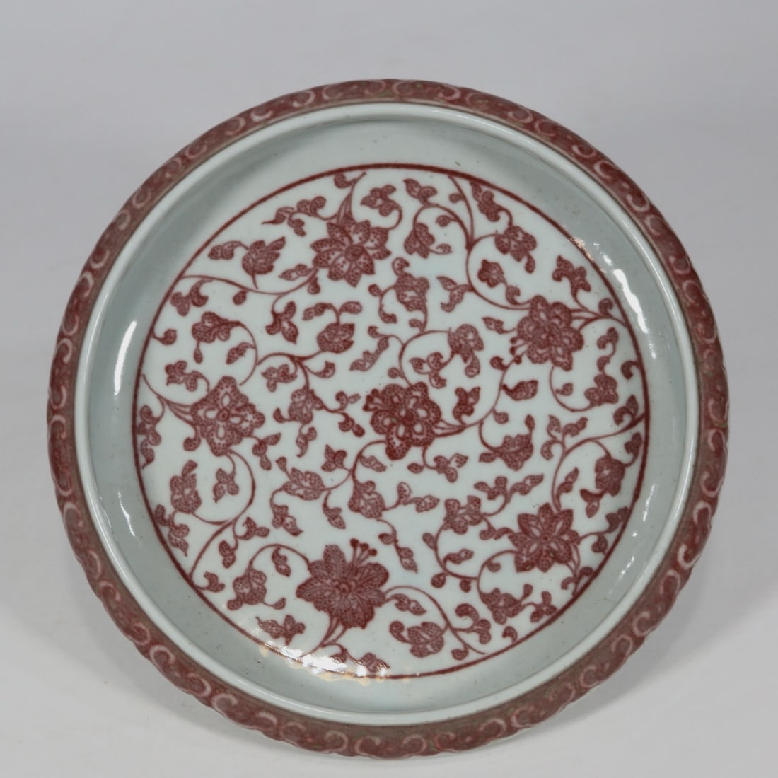 An Exquisite Underglaze-Red Lotus Pattern Brush Washer: An Exquisite Underglaze-Red Lotus Pattern Brush Washer,Qing Dynasty, China,Size:1.9inx7.9in釉里红缠枝莲纹笔洗,中国清代,Siz
