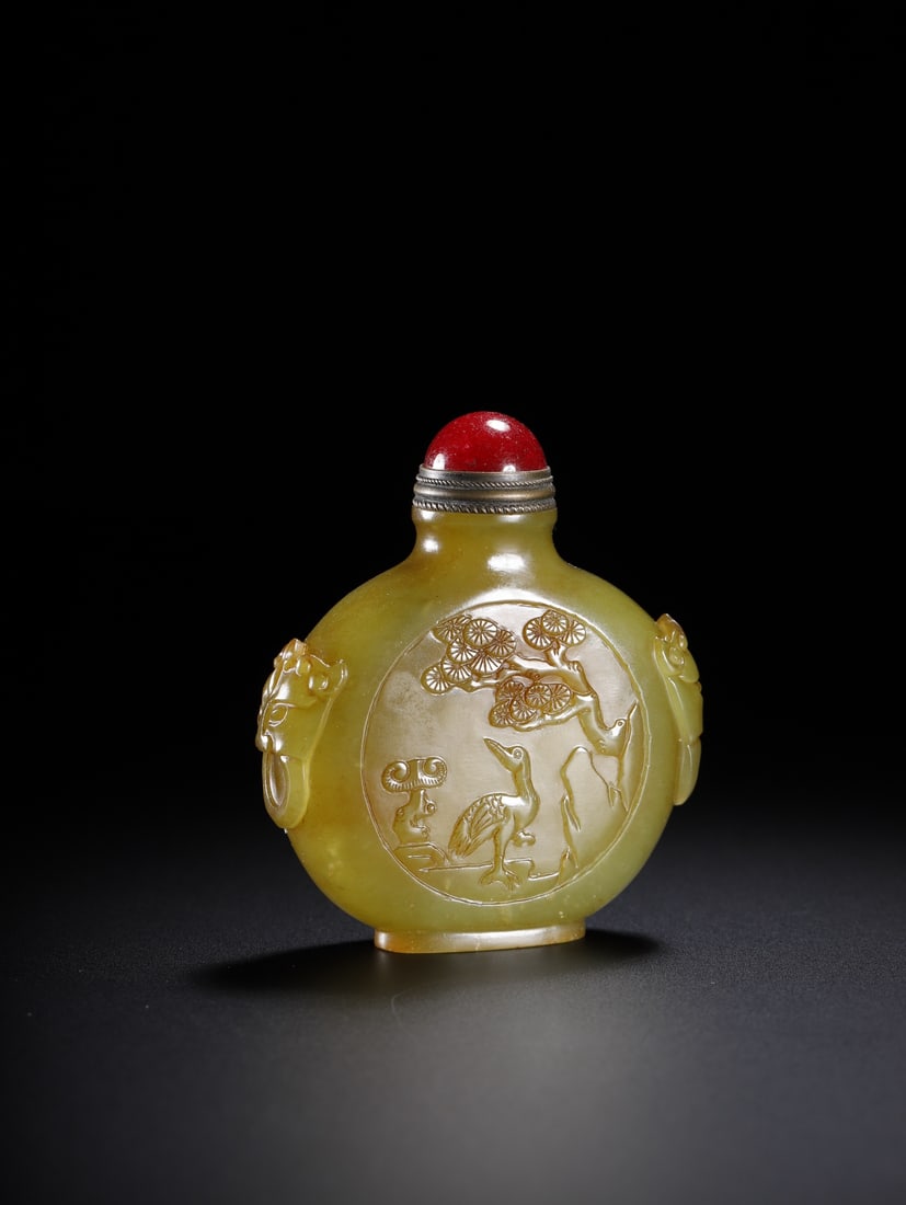 An Exquisite Yellow Jade Pine,Crane and Deer Pattern Beast-Ears Snuff Bottle (1 of 9)