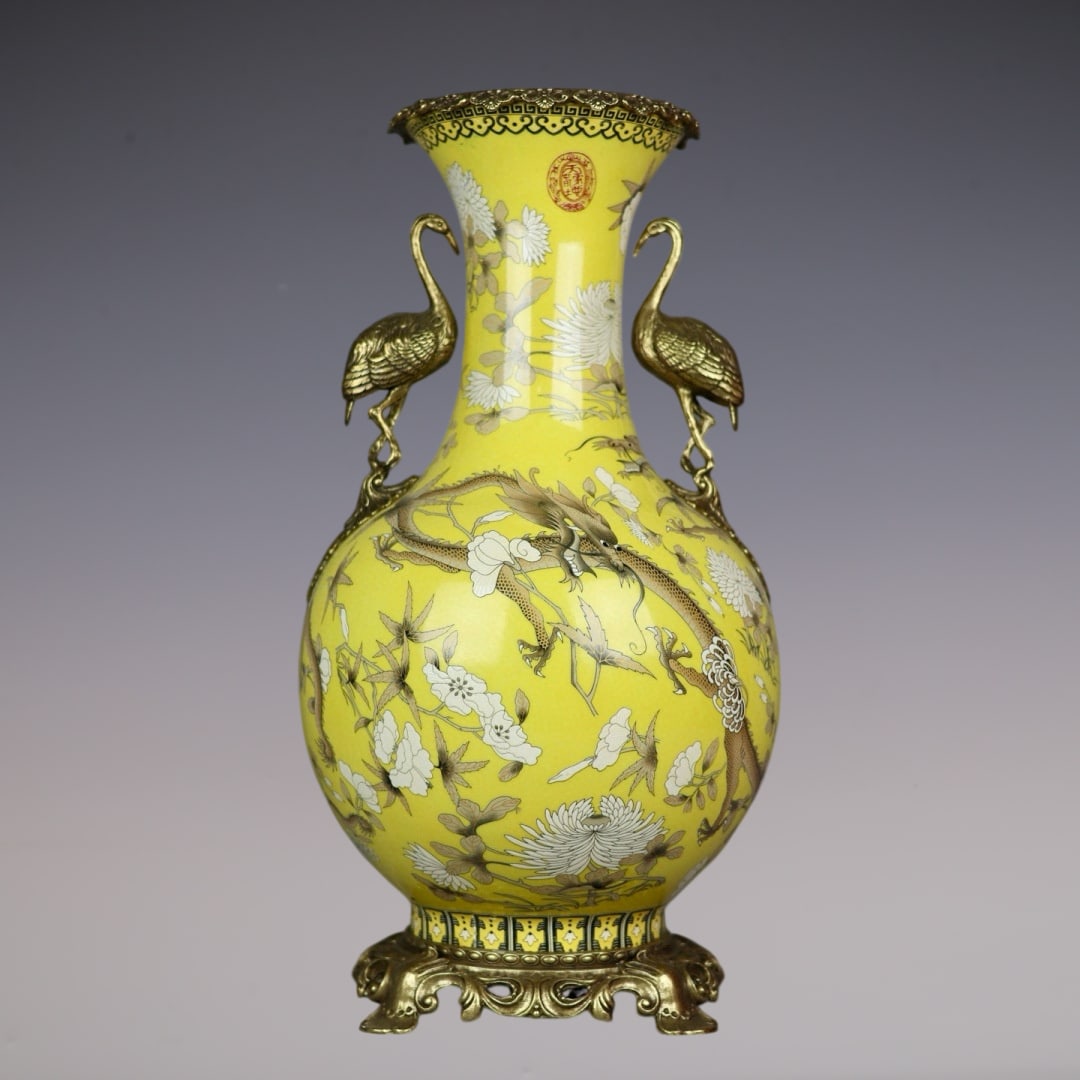 A Huge Yellow Ground Famille-Rose Inlaid Bronze Flower and Dragon Pattern Crane-Ears Vase: A Huge Yellow Ground Famille-Rose Inlaid Bronze Flower and Dragon Pattern Crane-Ears Vase,Qing Dynasty,China,With Mark,Size:18.9inx9.4inx7.9in黄地粉彩镶铜花&#