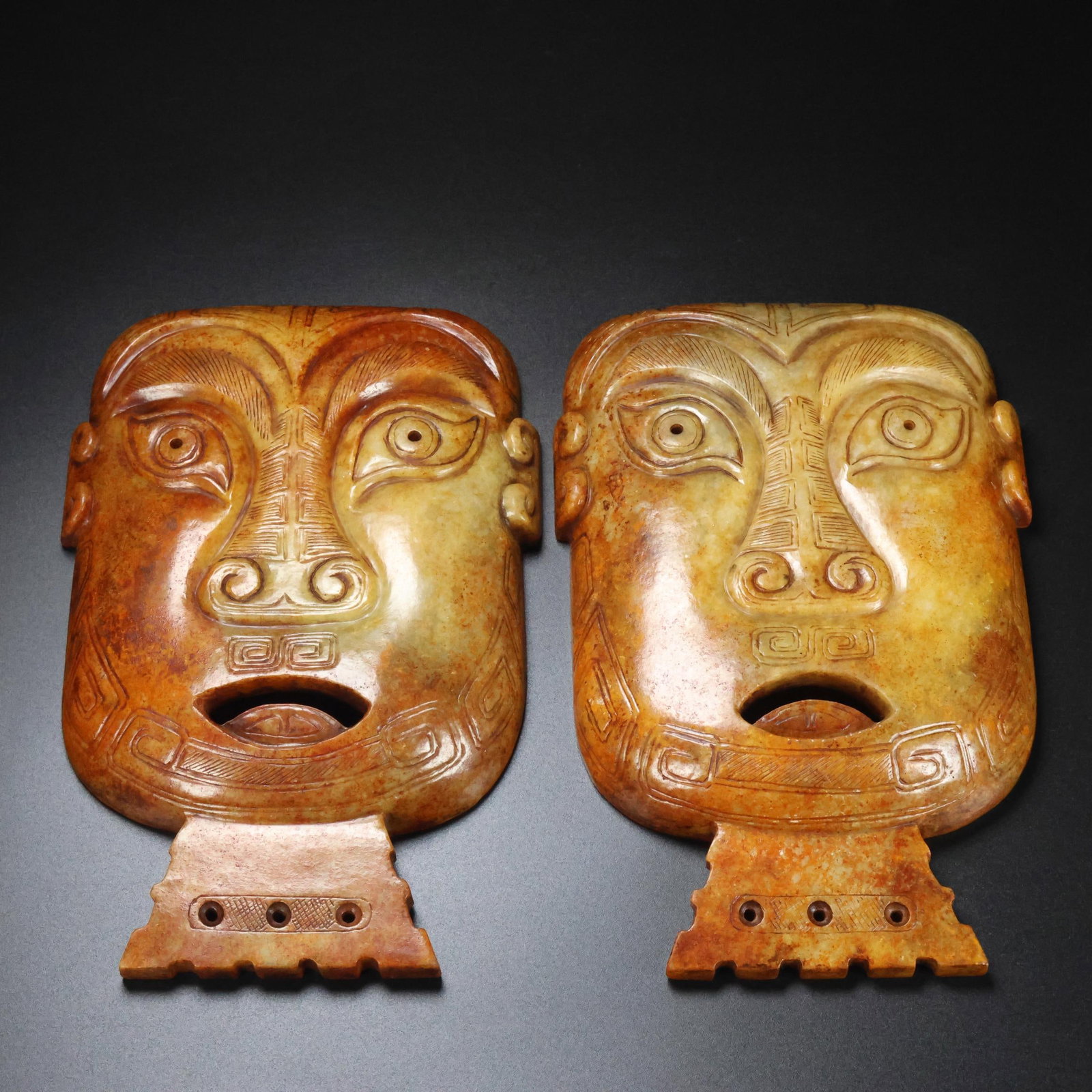 A Pair of Exquisite White Jade Masks: A Pair of Exquisite White Jade Masks,Qing Dynasty,China,Size:5.1inx7.5inx1.4in,Total