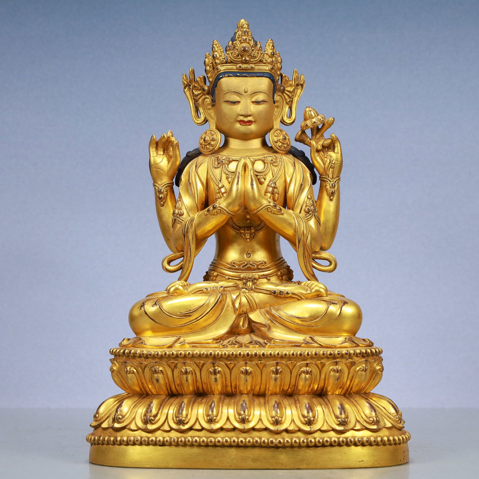 A Exquisite Gilt Bronze Four-arms Statue of Avalokitesvara: A Exquisite Gilt Bronze Four-arms Statue of Avalokitesvara Ming Dynasty, China Yongle Six-character Mark Size:9.1inx5.5inx13.8in Weight:5850g铜鎏金四臂观音 &#