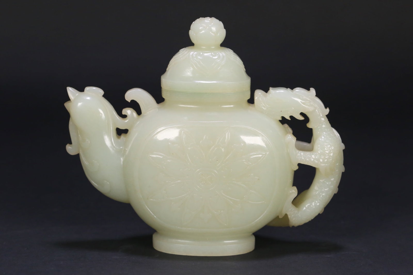 An Exquisite White Jade Flower Pattern Dragon handle Phoenix-head Ewer (1 of 9)