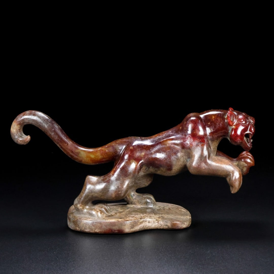 An Exquisite White Jade Tiger Ornament (1 of 9)