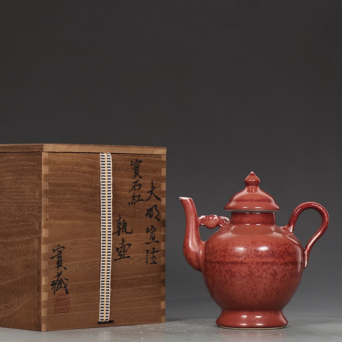 An Exquisite Ruby red-Glazed Ewer: An Exquisite Ruby red-Glazed Ewer,Ming Dynasty,China,Xuande Six-character Mark,Size:6.9inx2inx4.5in宝石红釉执壶,中国明代,宣德
