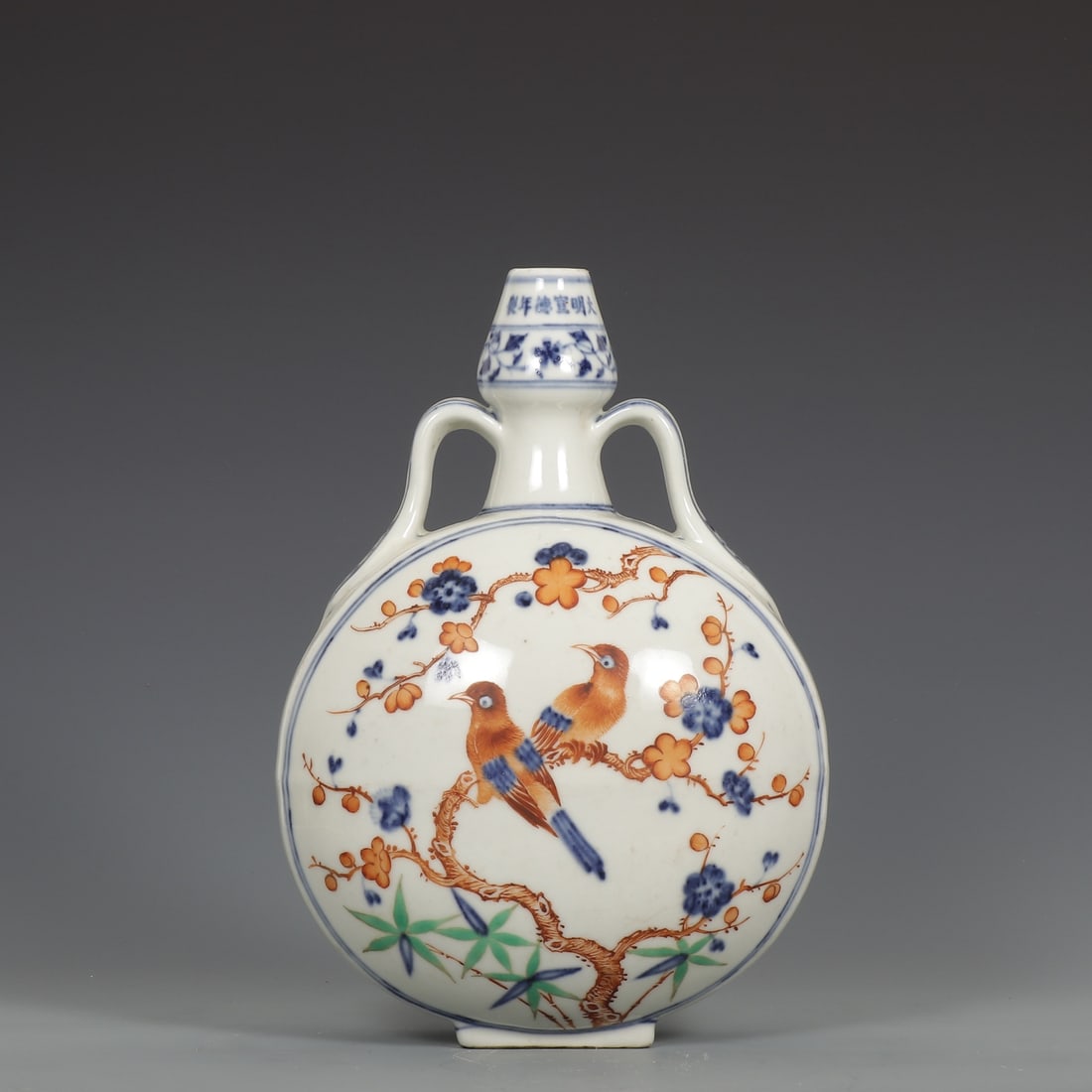 An Exquisite Blue and White Wucai Pomegranate,Flower and Bird Pattern Double-Ears Vase: An Exquisite Blue and White Wucai Pomegranate,Flower and Bird Pattern Double-Ears Vase,Ming Dynasty,China,Xuande Six-character Mark,Size:11.4inx1.2inx7.9in青花五彩石Ď