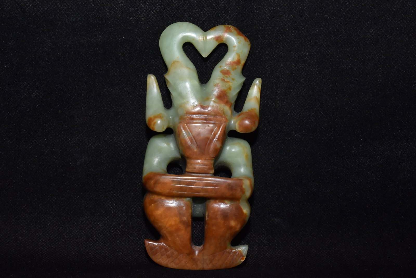 An Exquisite Hemo Jade Sun God Ornament (1 of 6)